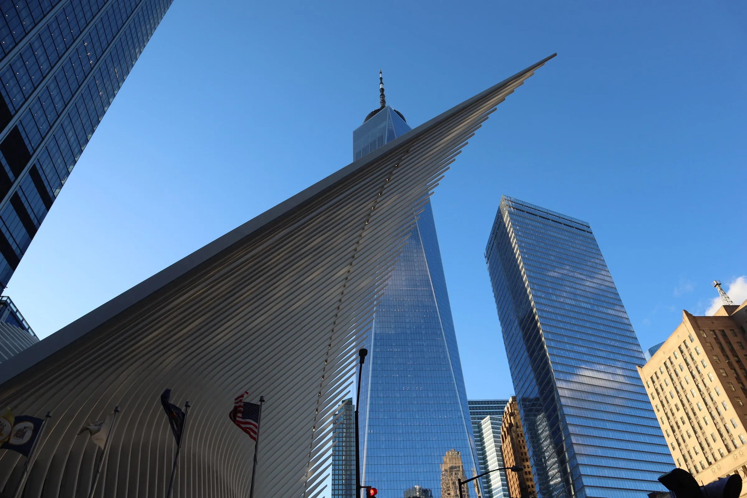 The white ribs of the Oculus in New York, with One World Trade Center behind it.